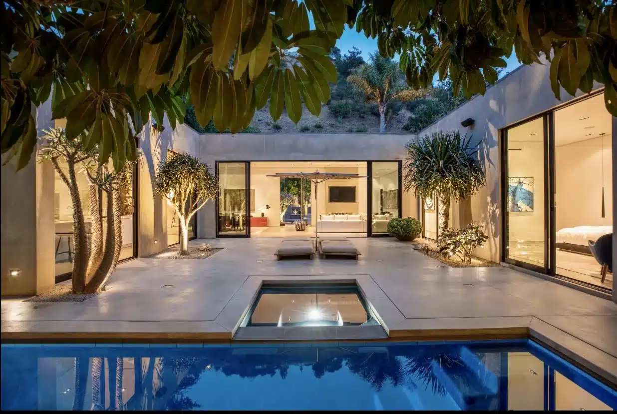 Lacw decorative concrete microcement microtopping residential beverly hills pool deck nighttime H 01.